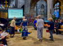 The paper boats were collected to be blessed by the bishop